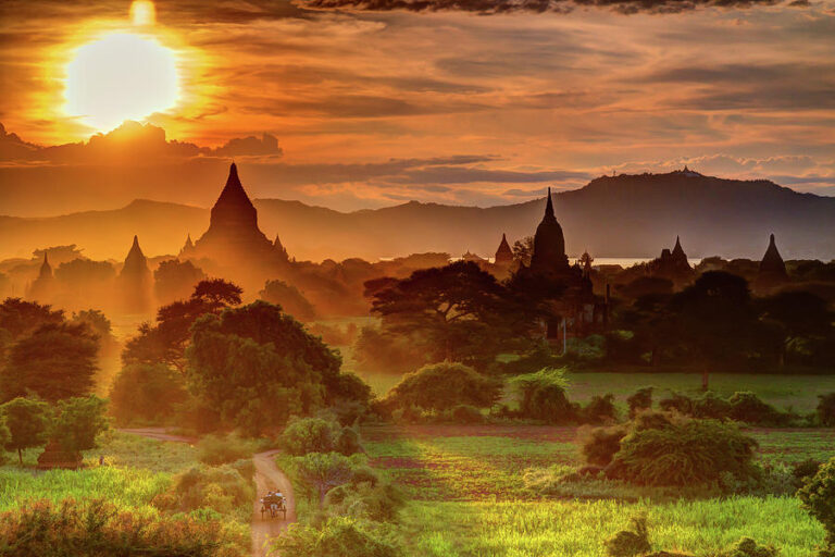sunset-over-bagan-temples-and-green-fields-in-myanmar-jecky-bershteyn